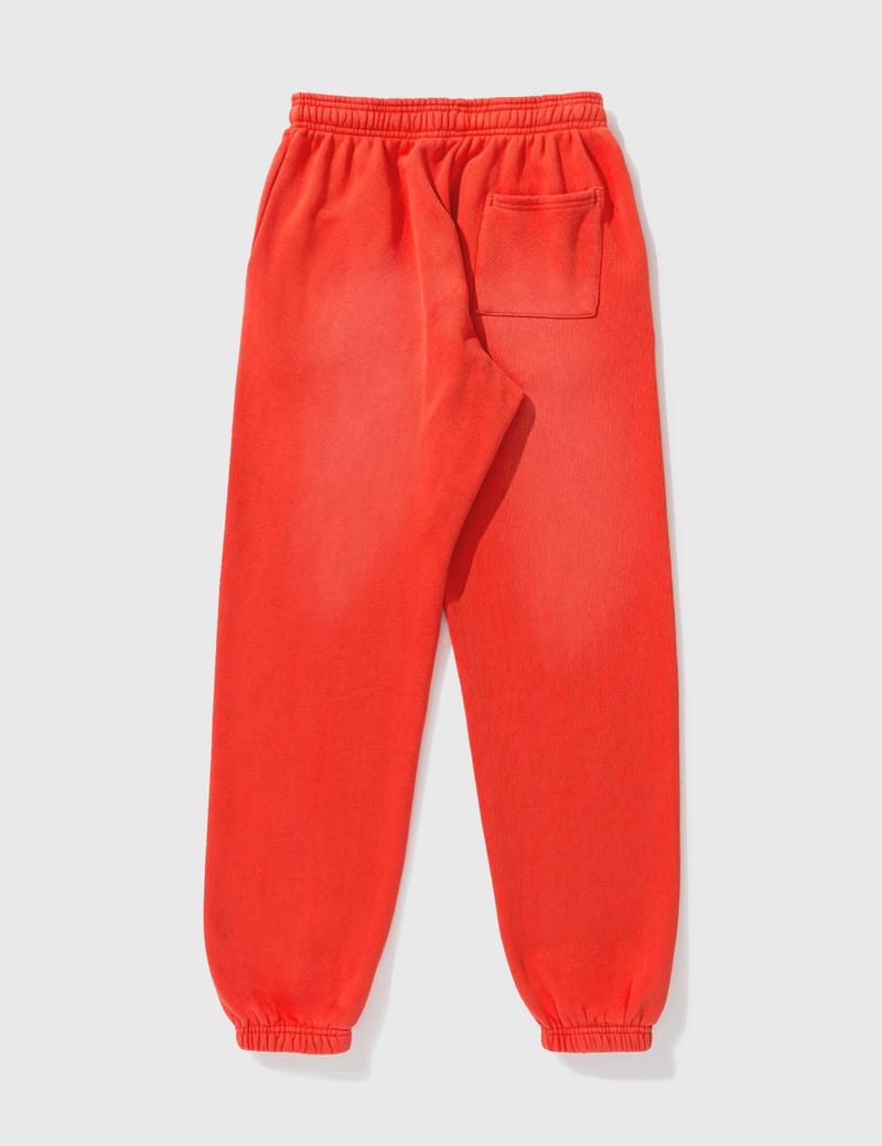 orange sweatpants in store