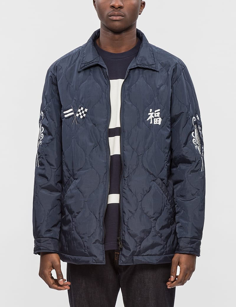 white mountaineering jacket