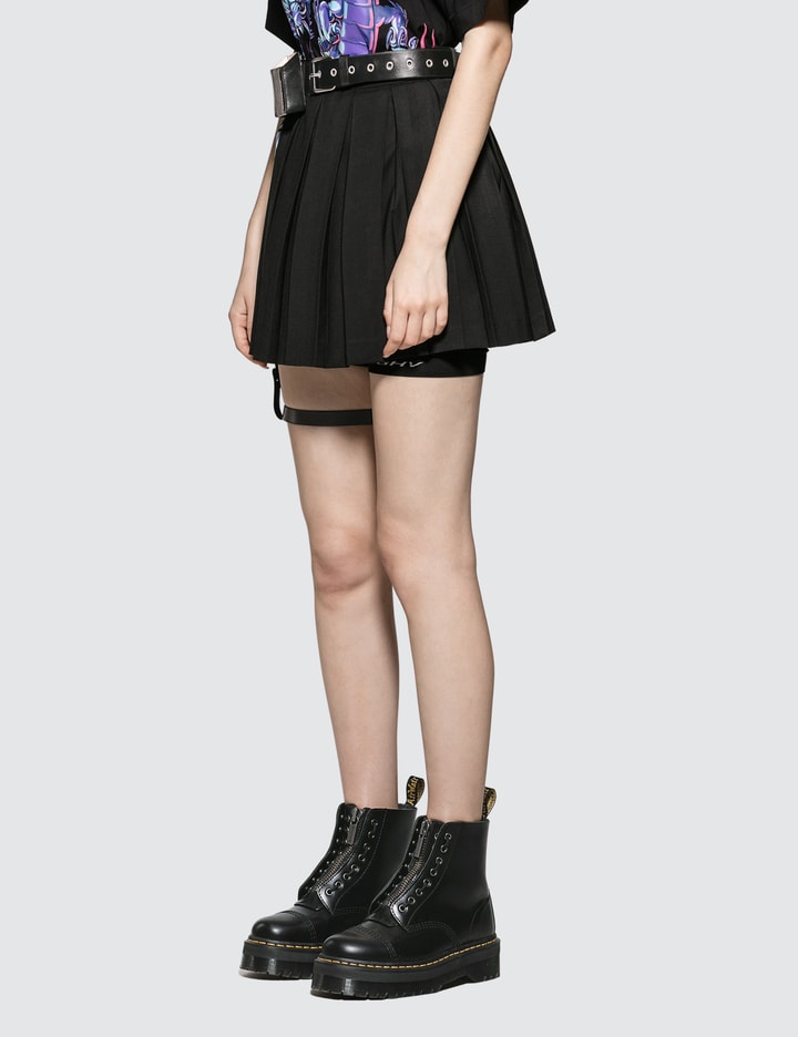 Pleated Skirt with Leather Garter Belt Placeholder Image