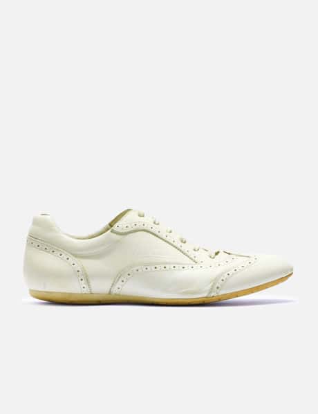 Louis Vuitton White Leather Wing Tipped Laser-cut Low Top dress Sneakers