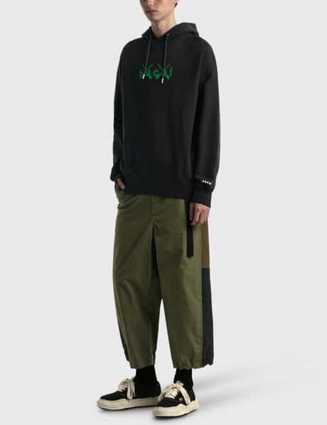 Sacai - KAWS Flock Print Hoodie | HBX - Globally Curated Fashion 