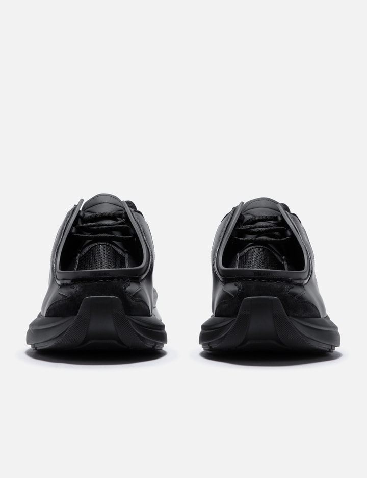 Shop Prada Systeme Brushed Leather Sneakers In Black