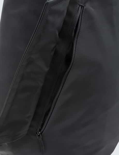 Eastpak X Raf Simons Sleek Sling Backpack In Black
