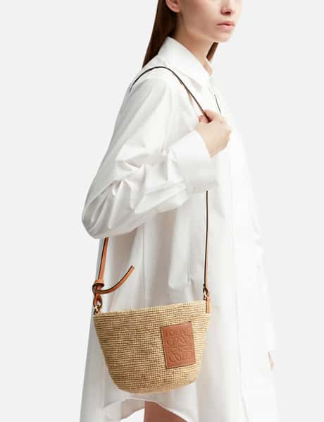 Shop LOEWE Pochette Leather-Trimmed Raffia Crossbody Bag