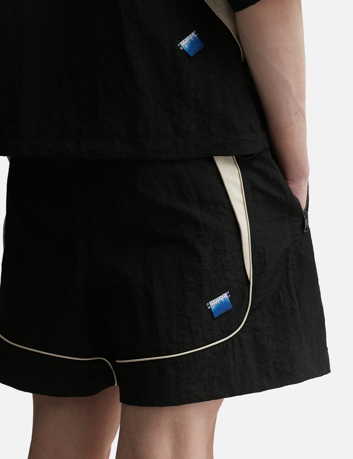 Shop Ader Error Faux Leather Accent Shorts In Black