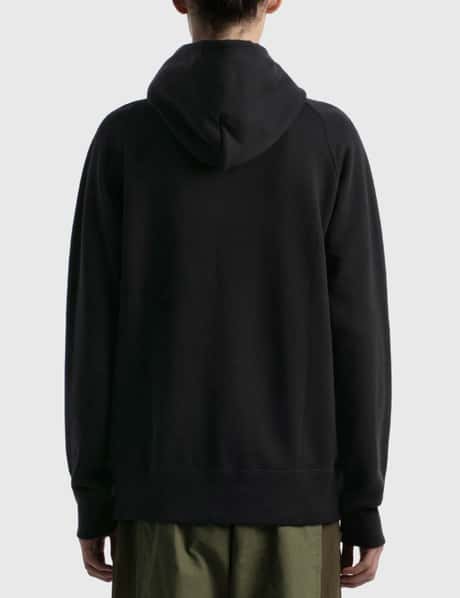 Sacai - KAWS Flock Print Hoodie | HBX