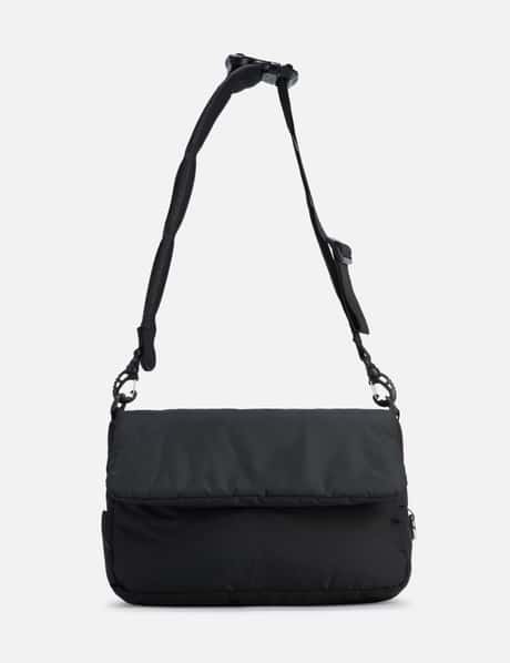 CLESSTE PADDED FLAP HOLIDAY BAG