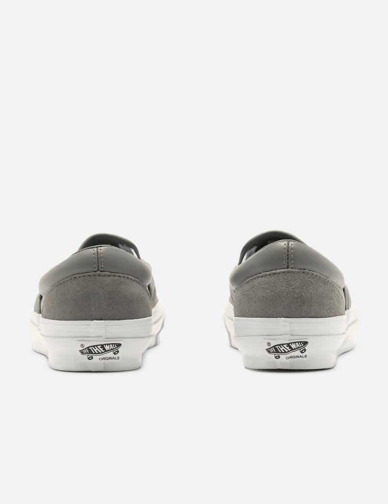 gray vans slip on