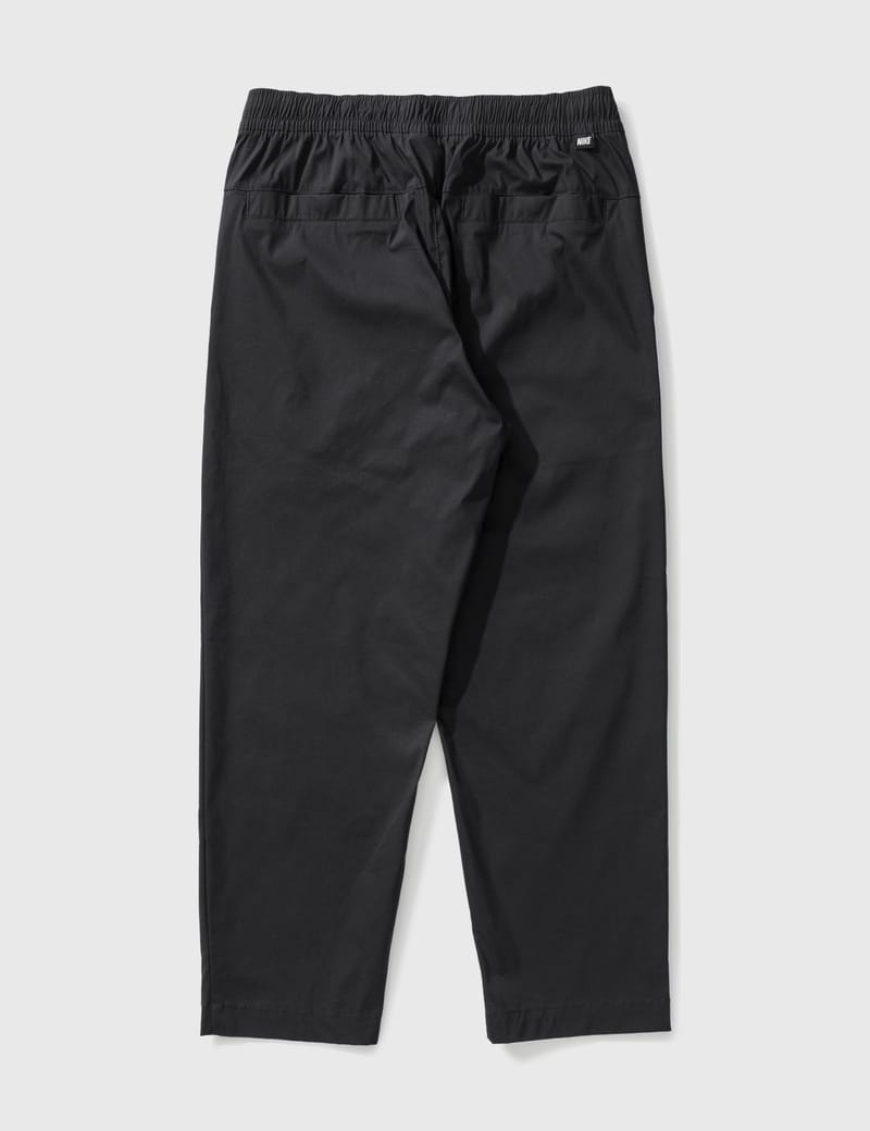 nike men's essential woven running pants