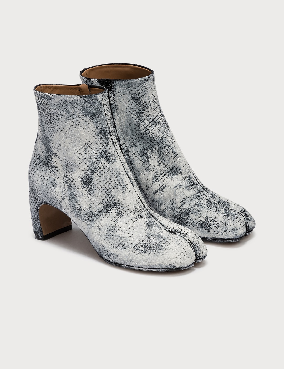 paint and leather ankle boots