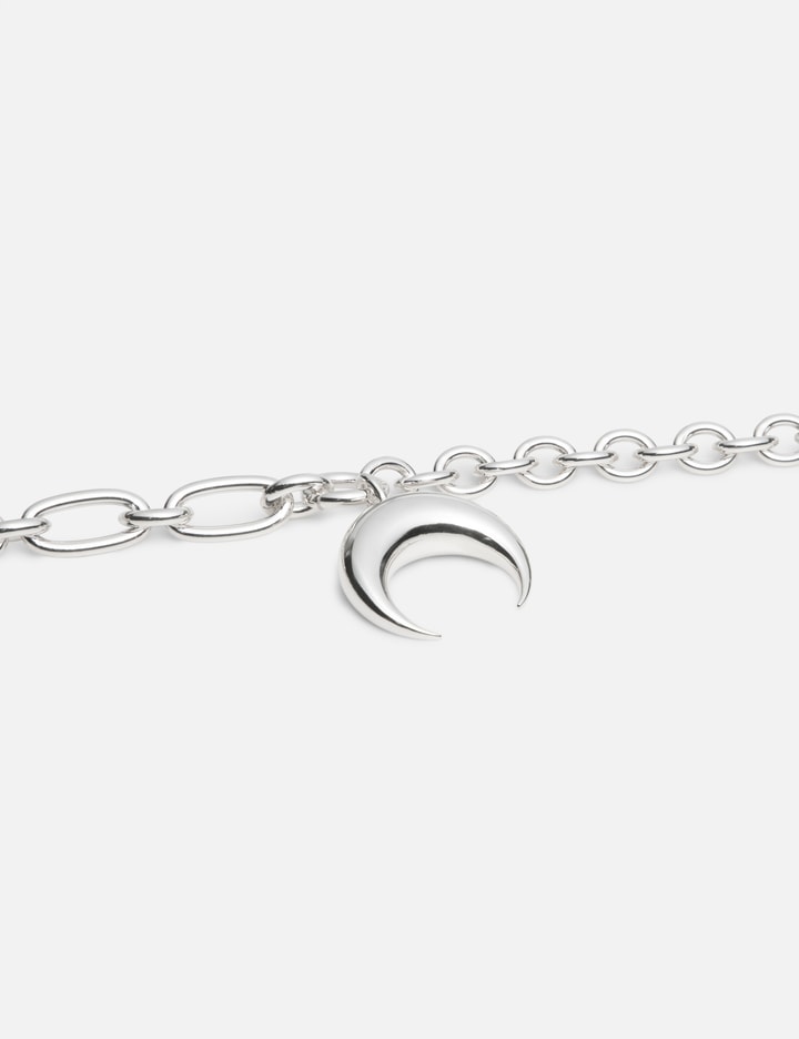 REGENERATED TIN MOON CHARMS NECKLACE Placeholder Image