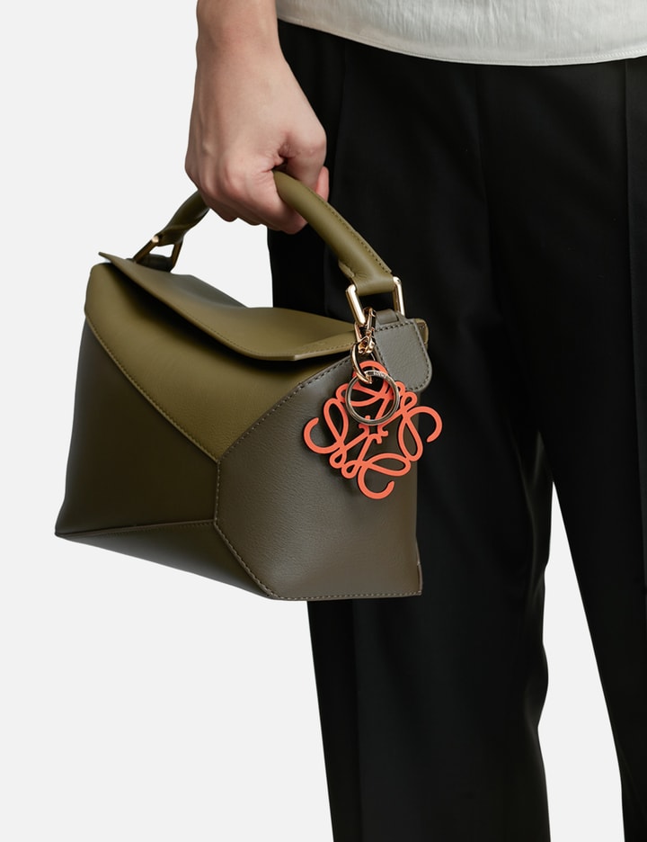 Shop Loewe Anagram Charm In Orange