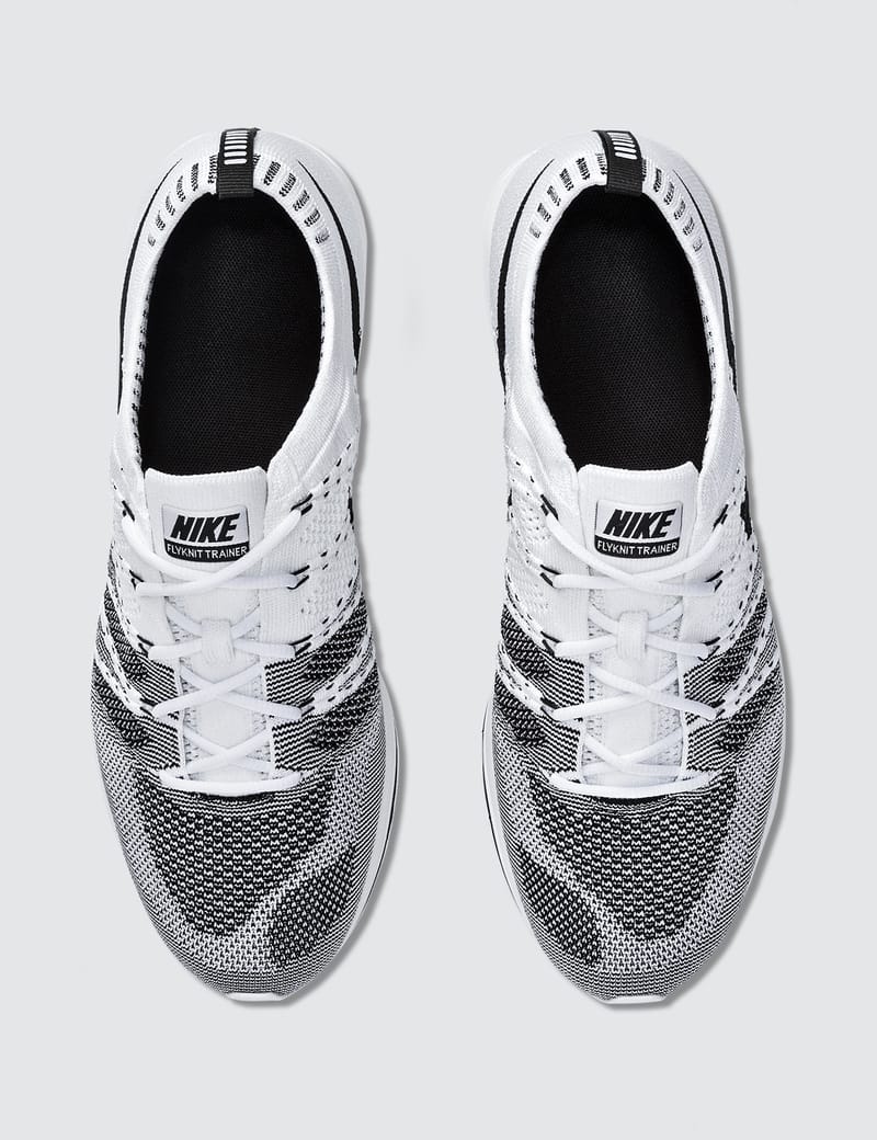 white nike flyknit trainer