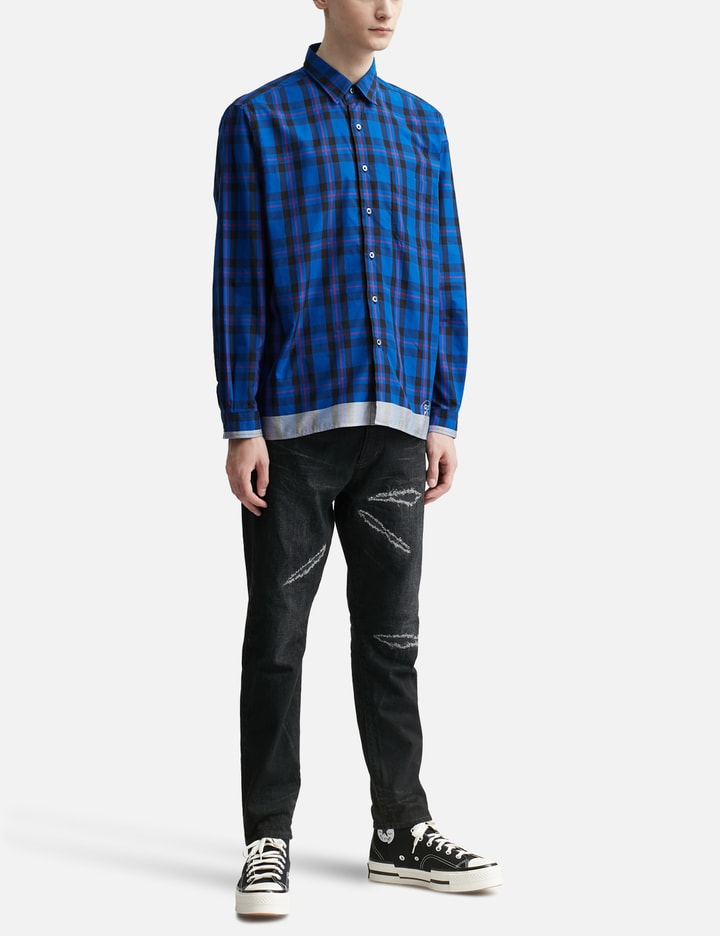 Shop Uniform Experiment Damaged Denim Tapered Pants In Black