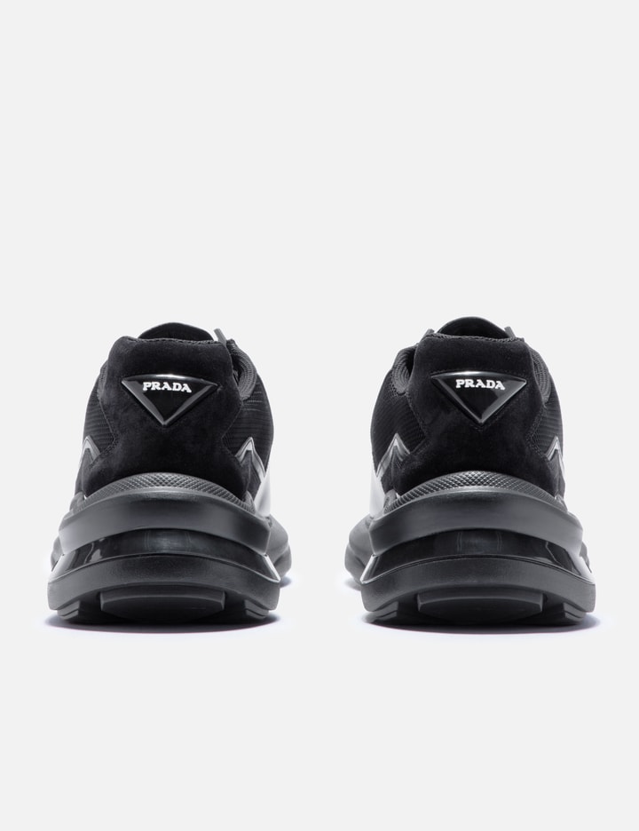 Shop Prada Systeme Brushed Leather Sneakers In Black