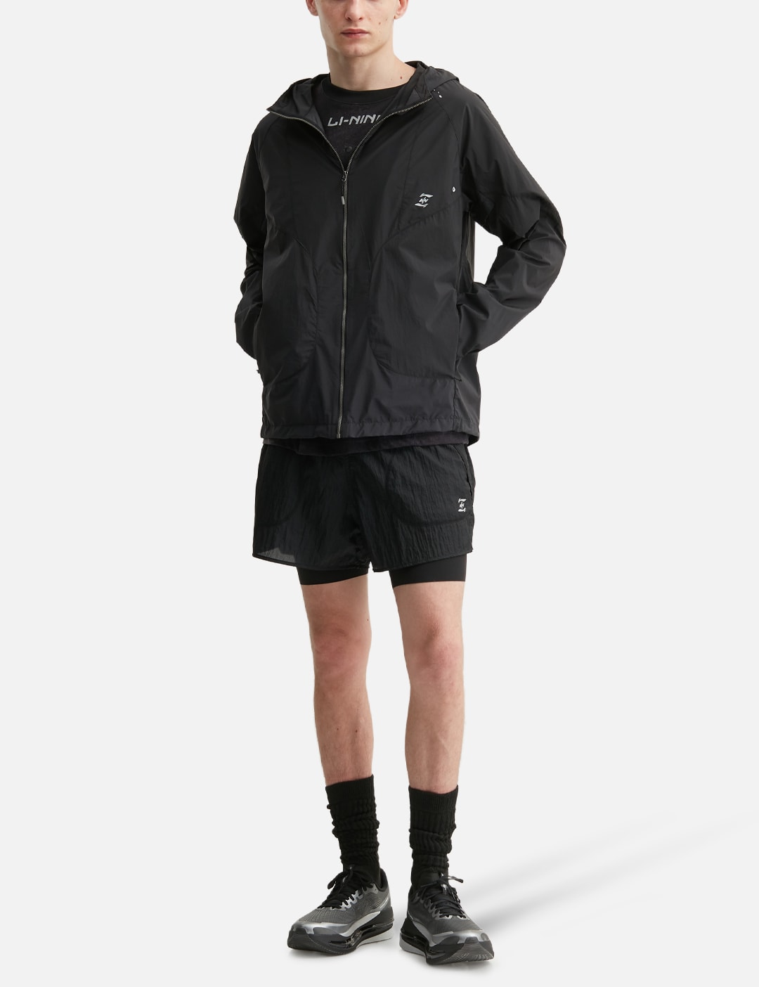 NīNEpointNīNE X Li-Ning Light Tracking Laser Windbreaker view 16