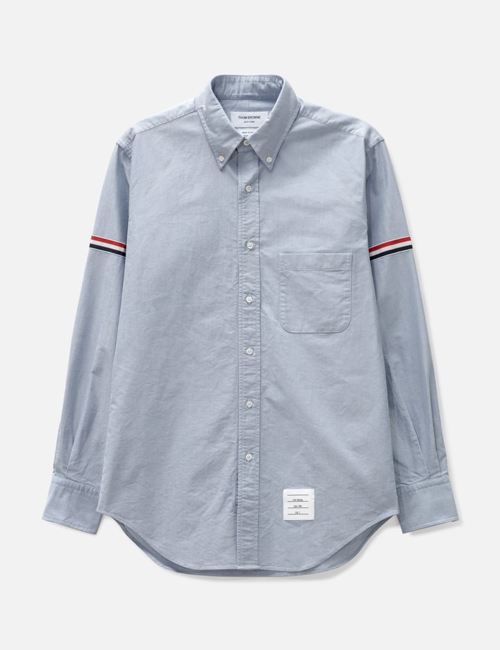Thom Browne Oxford Striped Grosgrain Armband Classic Shirt - Light blue oxford with striped armbands | HBX Thom Browne Oxford Striped Grosgrain Armband Classic Shirt - Light blue oxford with striped armbands | HBX