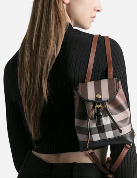 burberry micro check leather backpack Small Elite HNW Burberrys Embossed leather Backpack features a top flap and drawstring closure for secure and convenient access Burberry House Check Canvas Calfskin