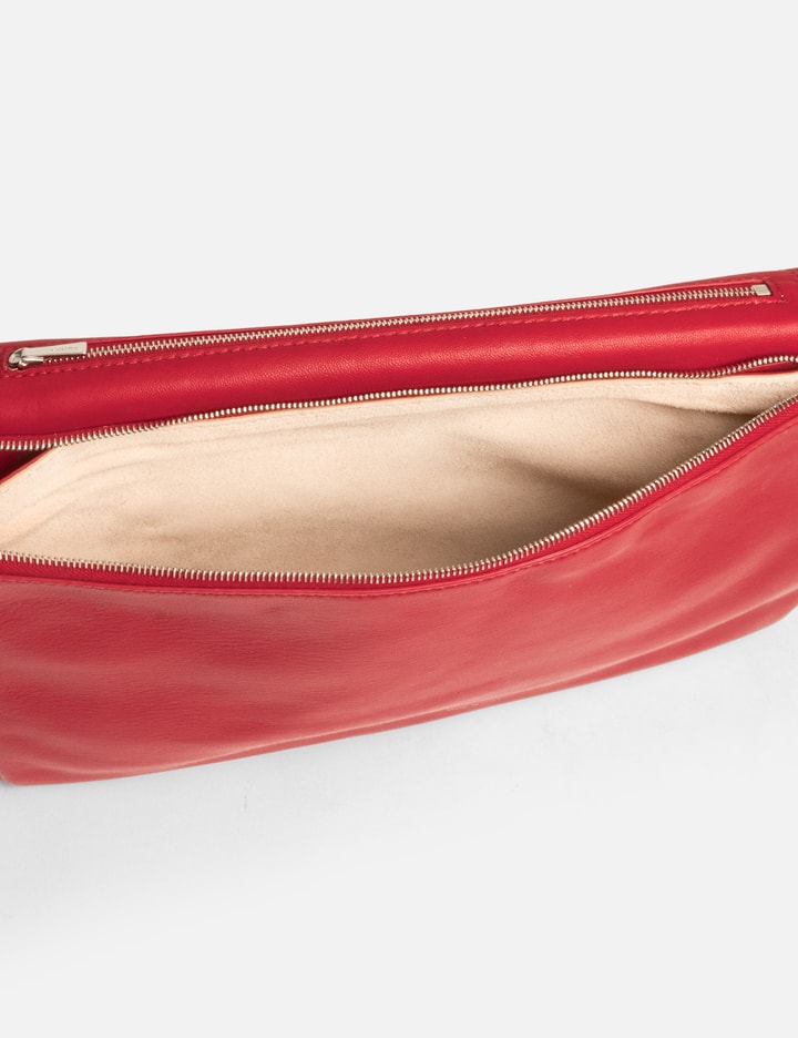 Shop Celine Trio Leather Clutch In Red