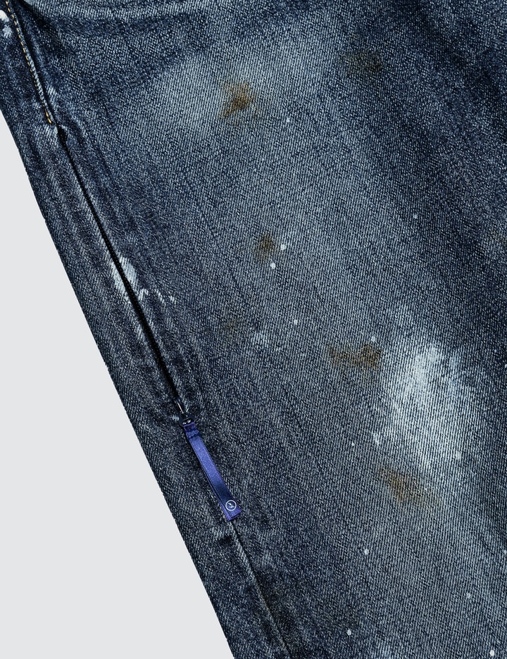 Used Paint Processing Tapered Denim Jeans Placeholder Image