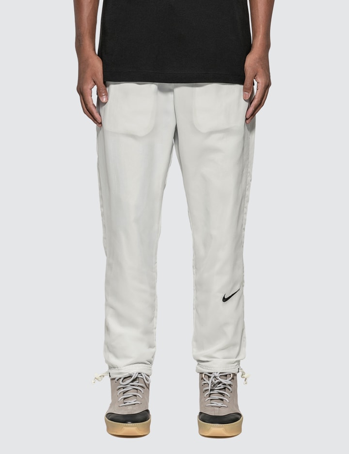 Nike - Fear Of God x Nike Woven Pants  HBX - Globally Curated Fashion and  Lifestyle by Hypebeast