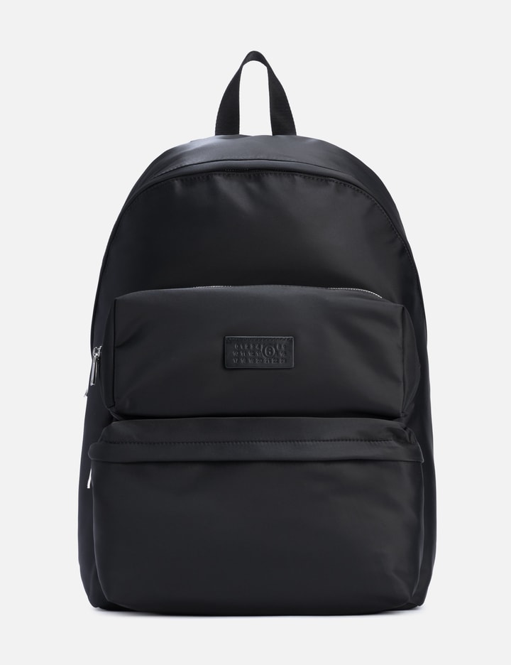 MM6 Maison Margiela Numeric Backpack in Black with front pocket and logo leather patch