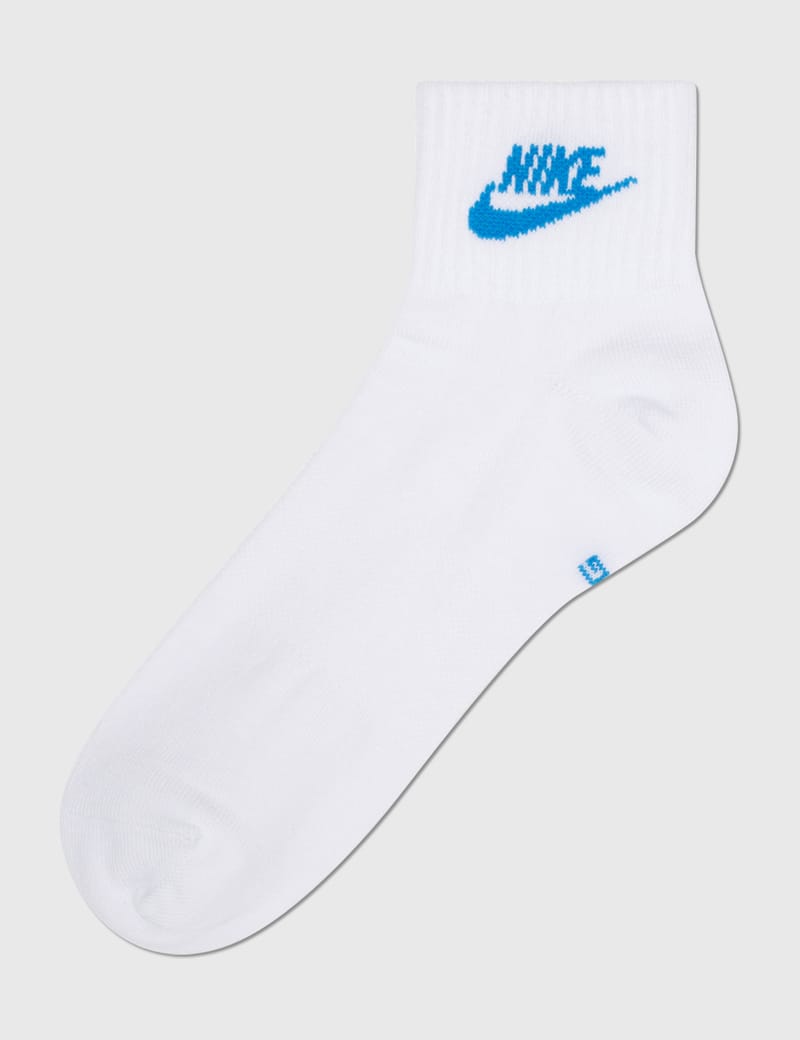 white nike socks with blue swoosh