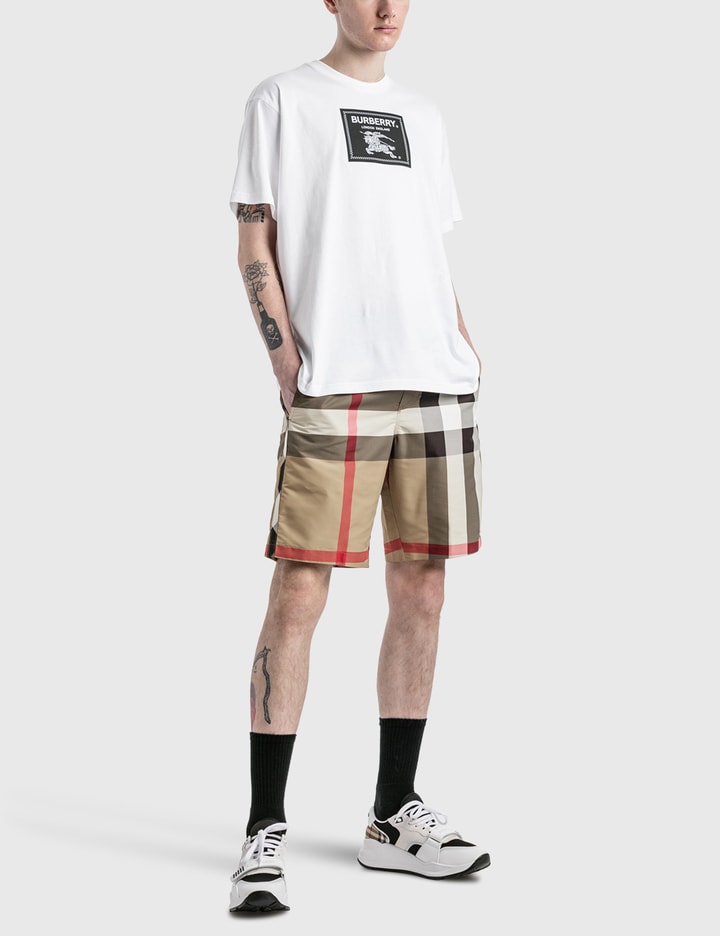 Shop Burberry Exaggerated Check Swim Shorts In Beige