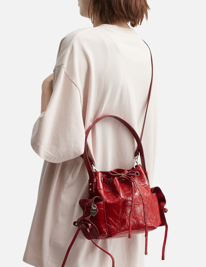 Multipocket Mini Bucket Bag Crinkled Patent Placeholder Image