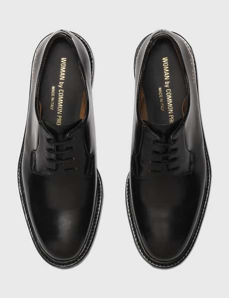 Common Projects Black Leather Derby Shoes with Cream Soles common-projects-derby-shine-  main image 4