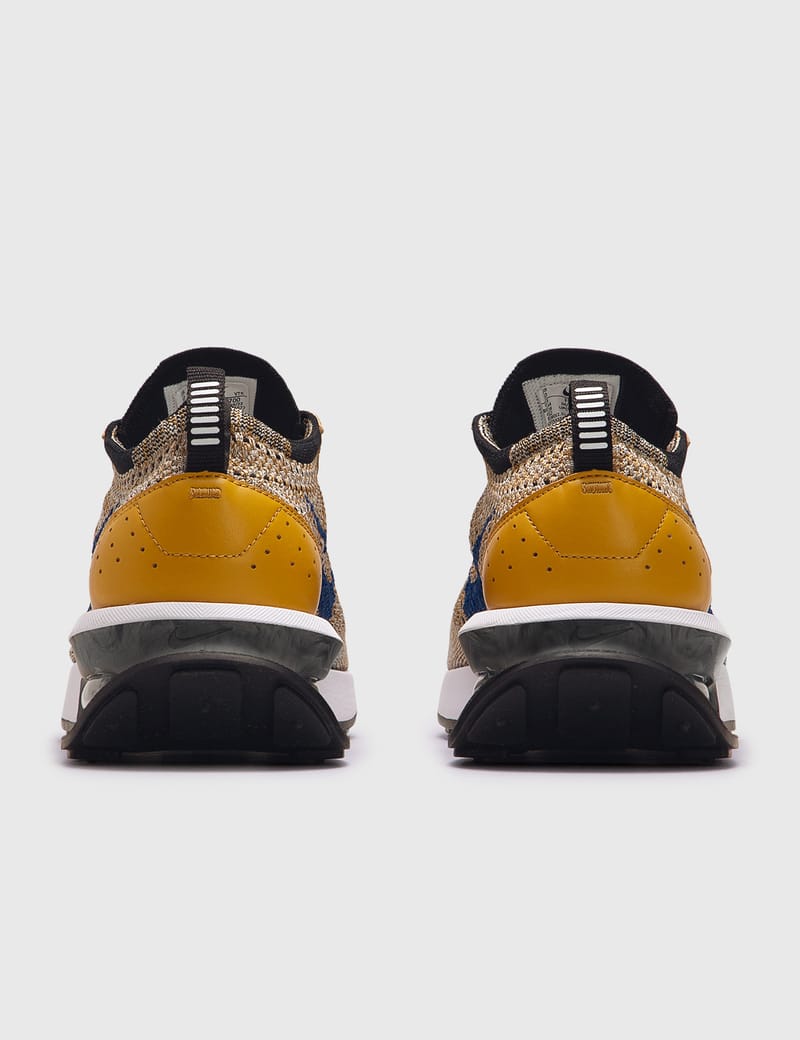 yellow flyknit racer