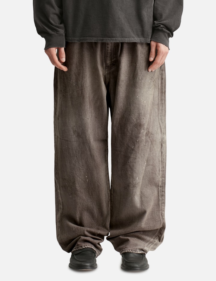 Ancellm Tapared Denim Pants In Brown