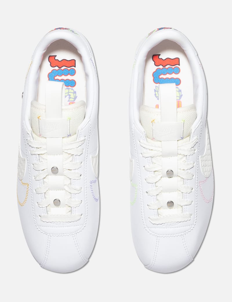 nike cortez white pink