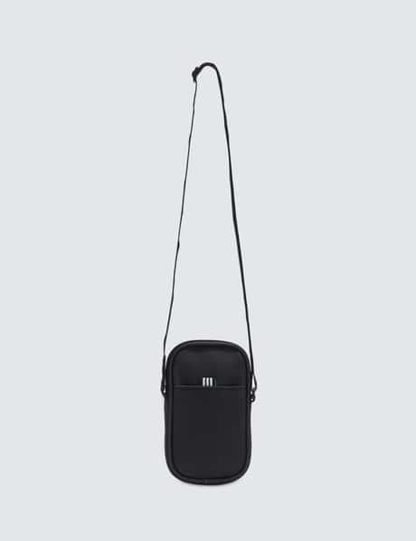 adidas Originals - Adidas NMD Pouch Bag | HBX adidas Originals - Adidas NMD Pouch Bag | HBX