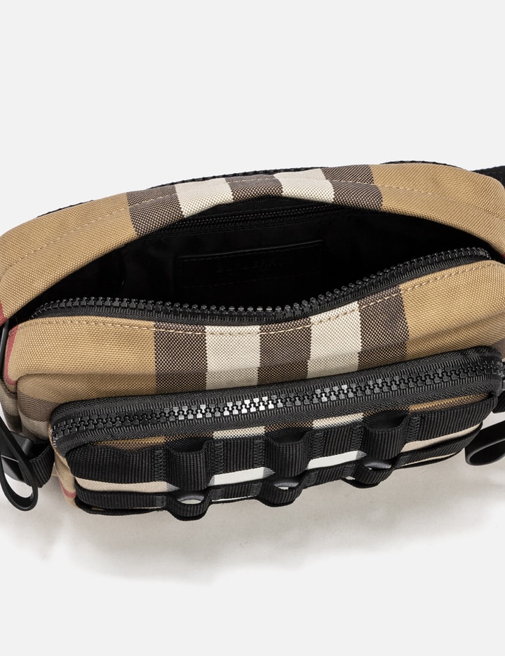 Shop Burberry Exaggerated Check Paddy Belt Bag In Beige