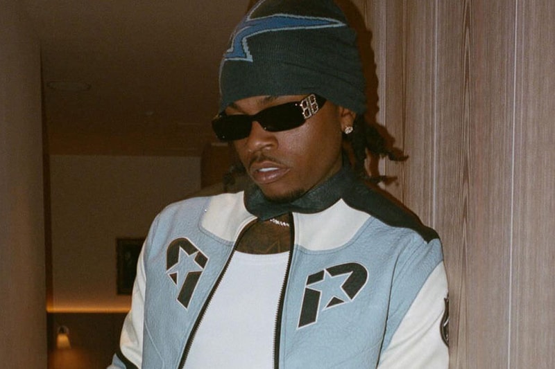 Gunna Launches "P By Gunna" Clothing Line rap one of wun album stream music rap spotify apple music album tidal dsp future beef rap design new york city times square billboard link stream jacket clothes fashion apparel streetwear bittersweet tour performance concert star racing