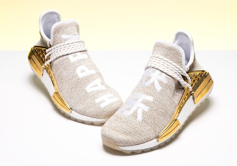 Pharrell x adidas Originals Hu NMD Trail in Gold | Hypebae