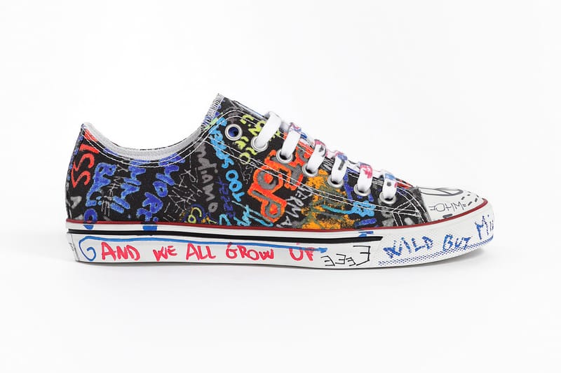 Shop Vetements' Graffiti Low Top Sneakers | Hypebae