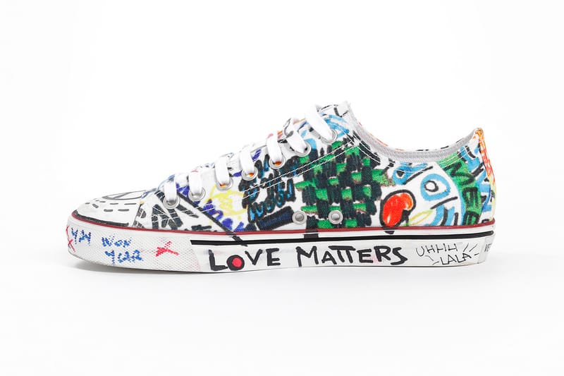 Shop Vetements' Graffiti Low Top Sneakers | Hypebae