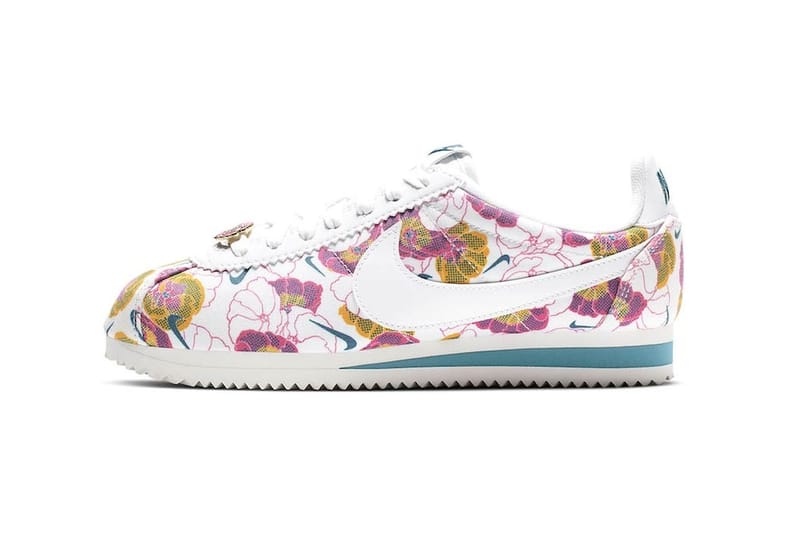 Nike cortez white on sale with pink swoosh