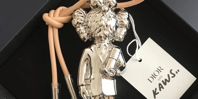 kaws dior 香水入れ Dior KAWS Limited Edition Silver Perfume Case | Hypebae