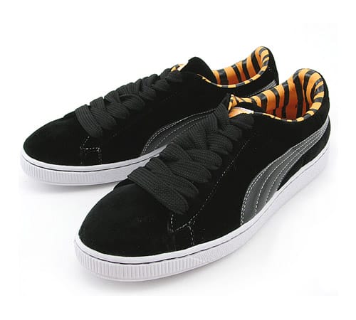 Black and gold pumas cheap animal