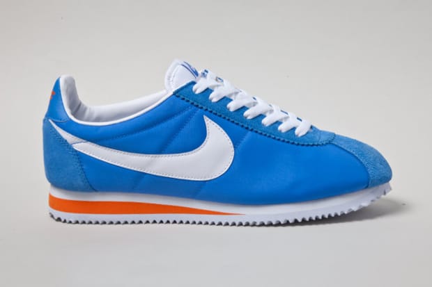 Nike cortez blue on sale orange