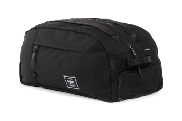 Herschel x stussy world discount tour backpack in black