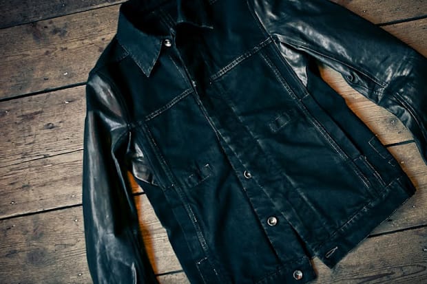 denim jacket with black leather sleeves