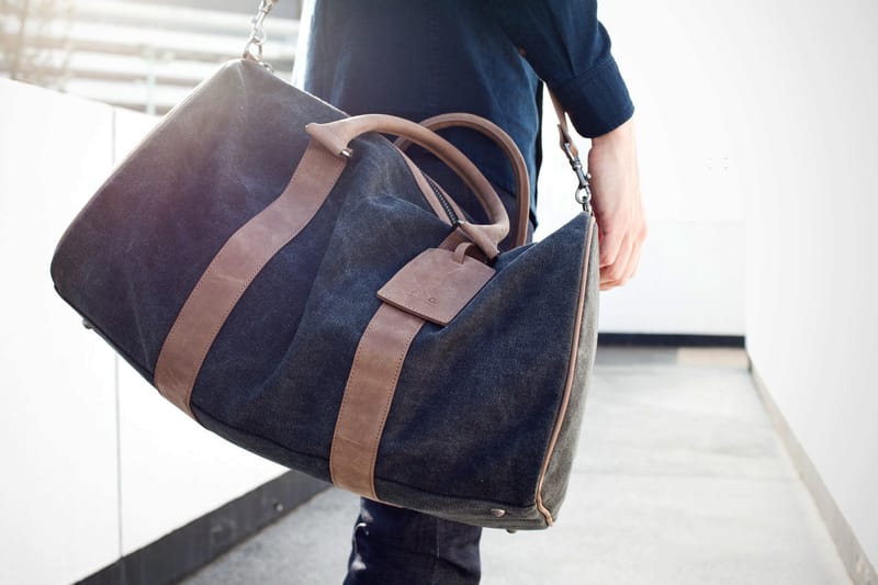 Black un voyage online bag