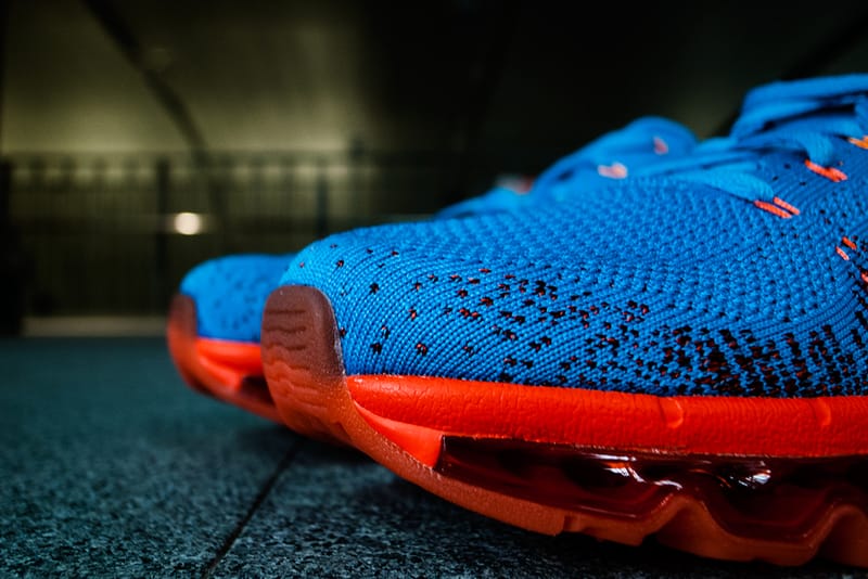 Nike flyknit blue hot sale and orange