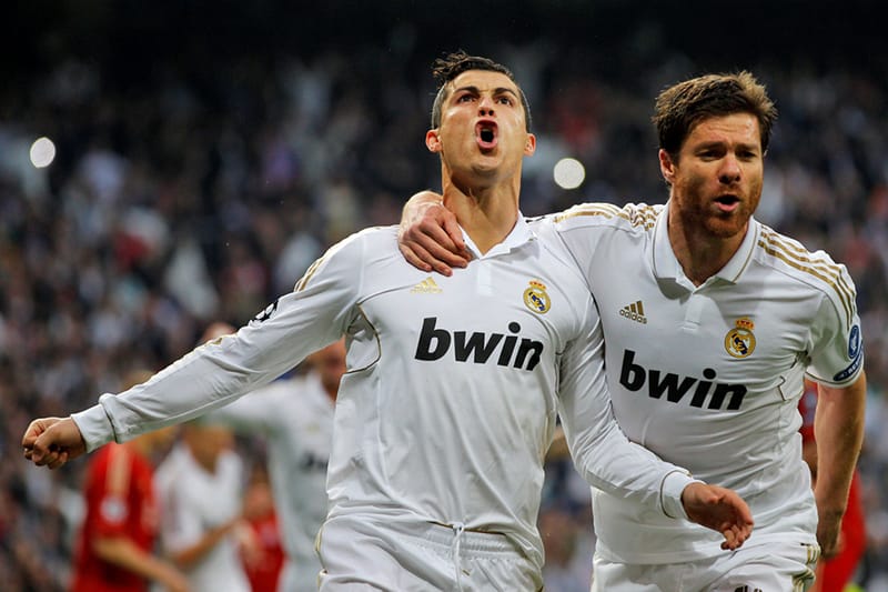 Real Madrid s Xabi Alonso and Cristiano Ronaldo Debate adidas vs. Nike