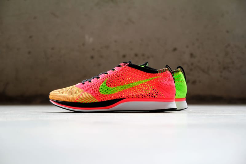 Nike flyknit pink and yellow sale