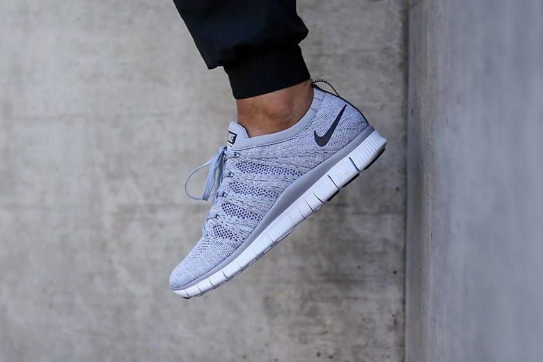 Nike free flyknit nsw silver on sale